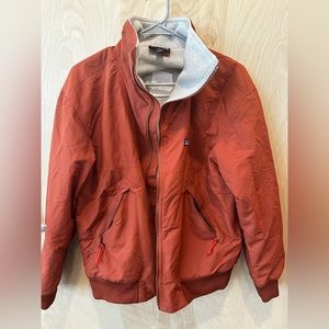 Patagonia burnt orange fleece lined bomber jacket - Tito’s Vodka logo on back
